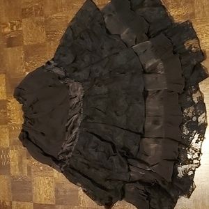 Black sheer lacy layered skirt, no labels, fits l/xl, stretch waistband